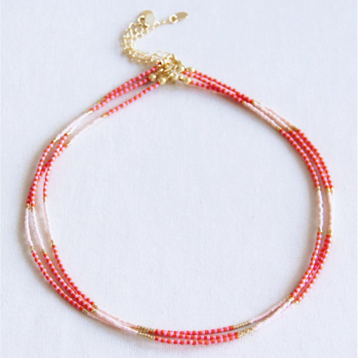 Kralen ketting oranje/roze/naakt