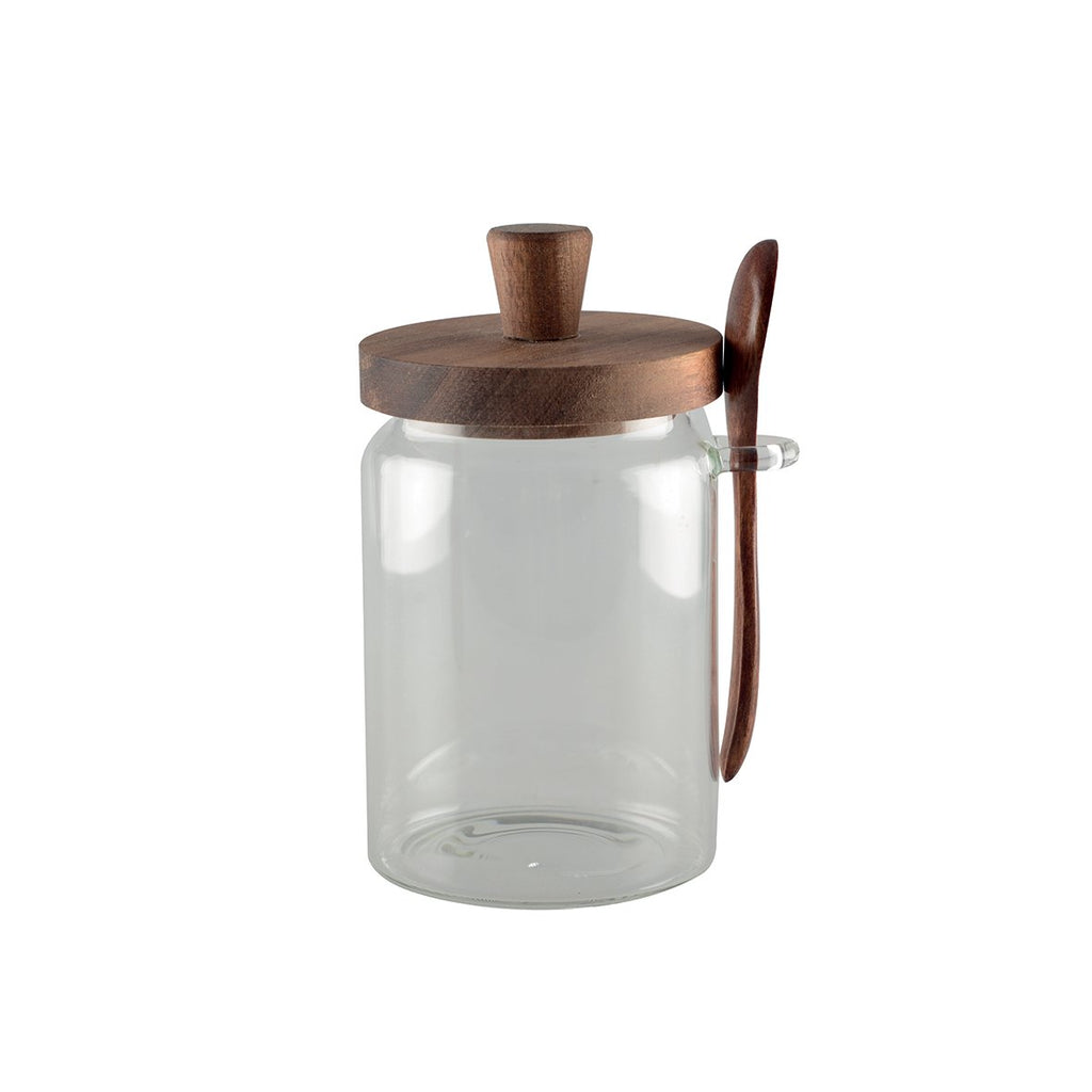 Glazen suikerpot met deksel en houten lepel