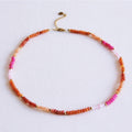 Gefacetteerde ketting - koraal/roze/oranje